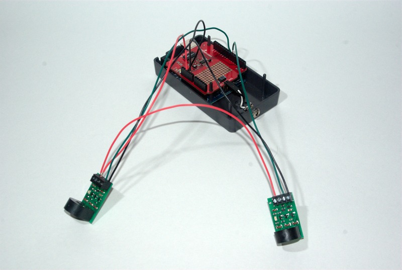 All of the wires from the NCE BD20s connected to the Arduino. The red wires connect to +5VDC on the Arduino.  The black wires are connected to a ground connection on the Arduino, and the green wires are connected to pins 6 and 7.